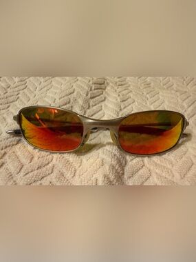Oakley Men's Gold Frame Sunglasses with Red-Orange Mirrored Lenses